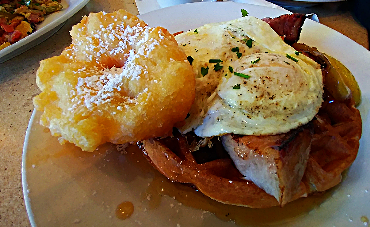The B.M.O.C. at Vovomeena features a waffle, pork chops, eggs, and a doughnut, all on one plate. - PATRICIA ESCARCEGA