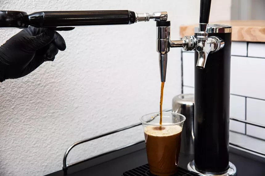 Nitro cold brew from local roaster Peixoto is on tap at the coffee bar. - JACOB TYLER DUNN