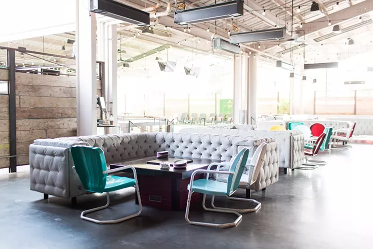 Culinary Dropout offers multiple places to lounge and relax with your holiday party guests. - CULINARY DROPOUT