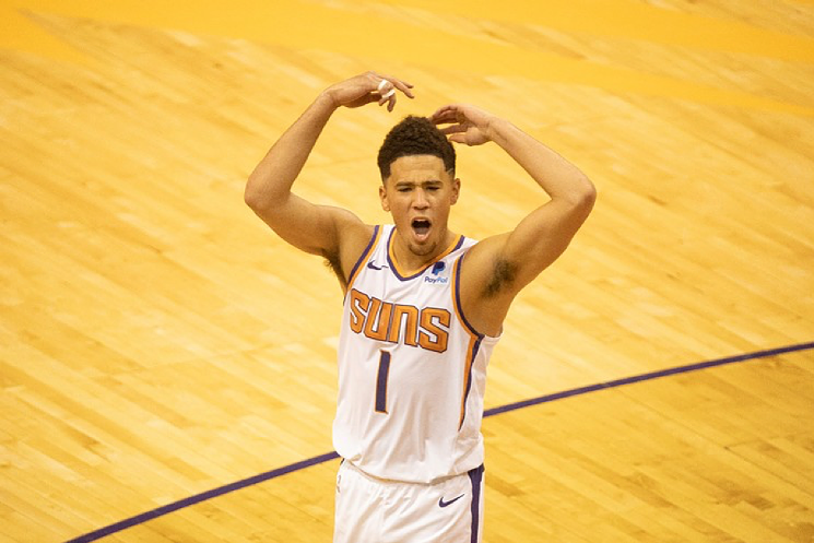 Devin Booker of the Phoenix Suns. - JIM LOUVAU