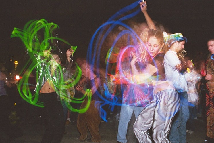 Ravers trip the light fantastic at Electric Highway in August 1997. - RAMY HOSSEINIE