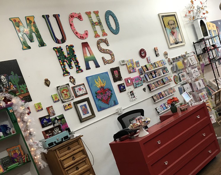 Getting a peek inside Mucho Mas Art Studio. - LYNN TRIMBLE