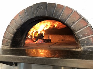 Wood-fired pizza is the Neapolitan and Arizonan way. - CHRIS MALLOY