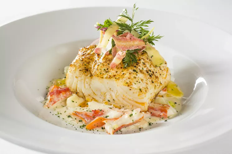 Seafood lovers will enjoy this entree — roasted sea bass over Alaskan king crab gnocchi. - OCEAN PRIME