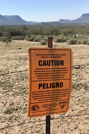 Warning signs eventually were posted at popular Table Mesa shooting sites, urging visitors to "avoid contact with surface materials..." - ELIZABETH WHITMAN