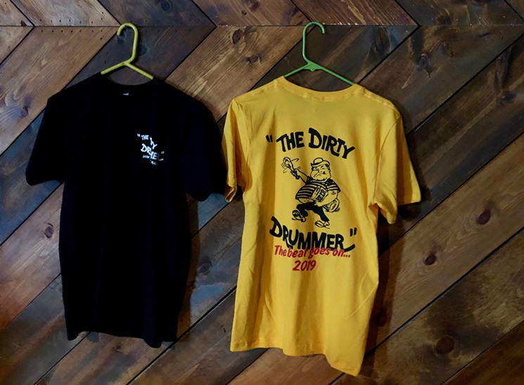 Add a classic black tee (pictured not so well on the left) to your order from The Dirty Drummer. - LAUREN CUSIMANO