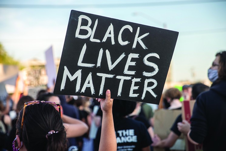 Black Lives Matter sign spotted during a Phoenix protest. - JACOB TYLER DUNN