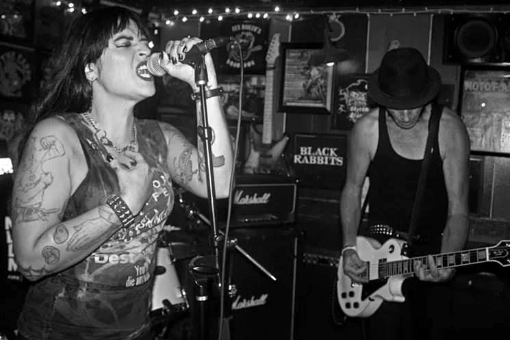 Sarah Shelton and her husband, Steve, tearing through one of The Brand's tight punk rock songs. - KARL WENTZEL