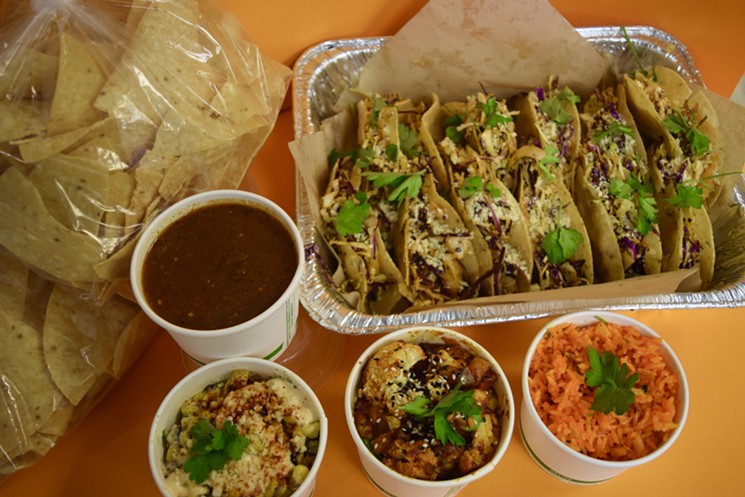 Tacos Dorados filled with roasted vegetables, tomatillo cruda, and salsa macha. - GUACSTAR KITCHEN & CANTINA