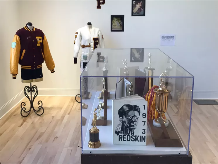 Artifacts displayed inside the gallery during the opening of the Phoenix Indian School Visitors Center. - LYNN TRIMBLE