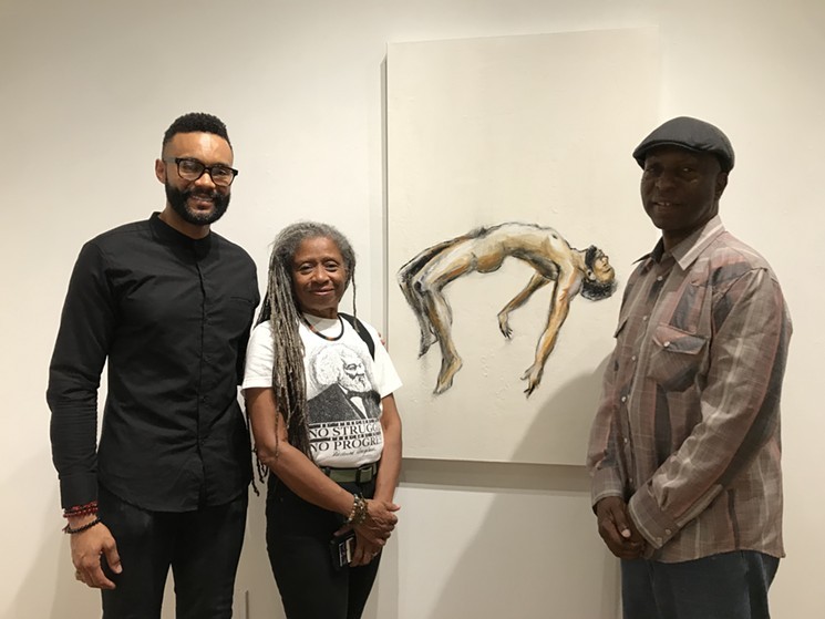 Clottee Hammons (center) of Emancipation Arts during a previous exhibit at Modified Arts. - LYNN TRIMBLE
