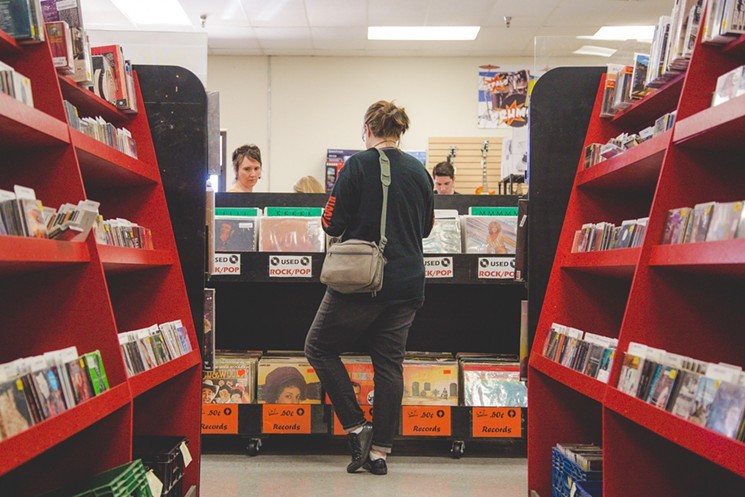 Customers browsing at Zia Records on Mill Avenue in Tempe. - JACOB TYLER DUNN