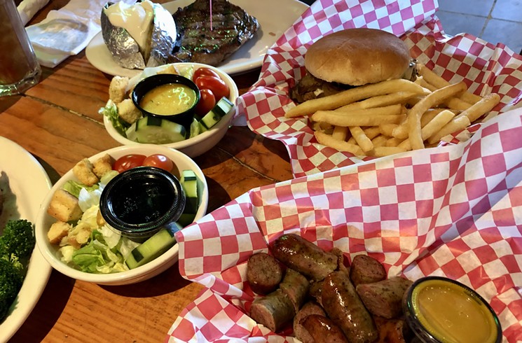 A spread from Buffalo Chip Saloon and Steakhouse. - LAUREN CUSIMANO