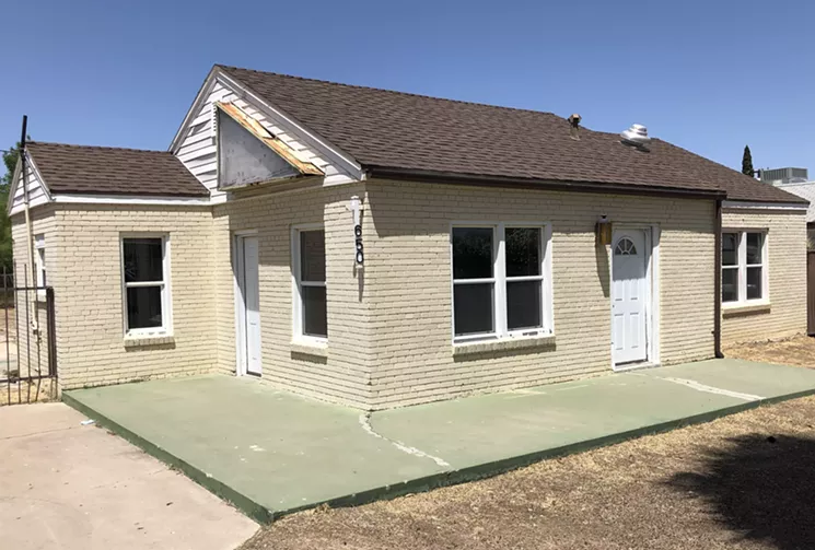 A former residence next to Char's will be converted into a walk-up pizza and coffee spot. - BENJAMIN LEATHERMAN