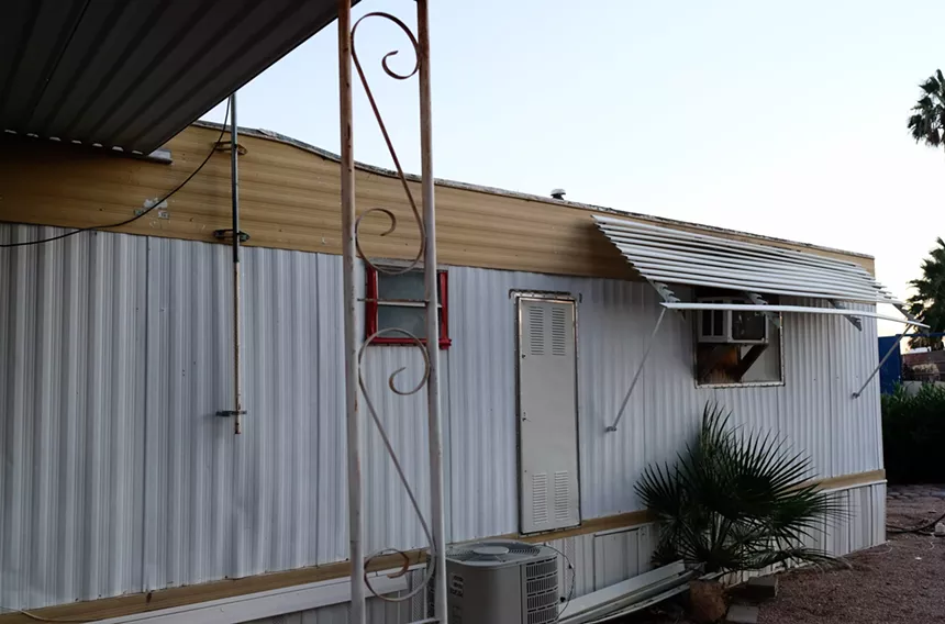 One family's 1968 mobile home in Mesa Gardens that, because of its age, cannot be moved. - KATYA SCHWENK