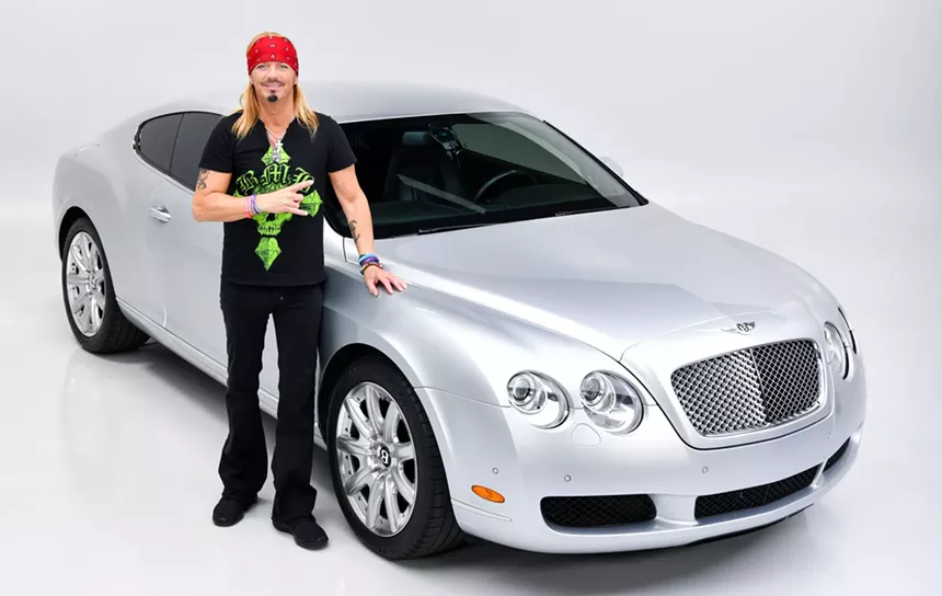 Poison frontman Bret Michaels with his 2007 Bentley Continental GT, which will be sold at this year's event. - BARRETT-JACKSON
