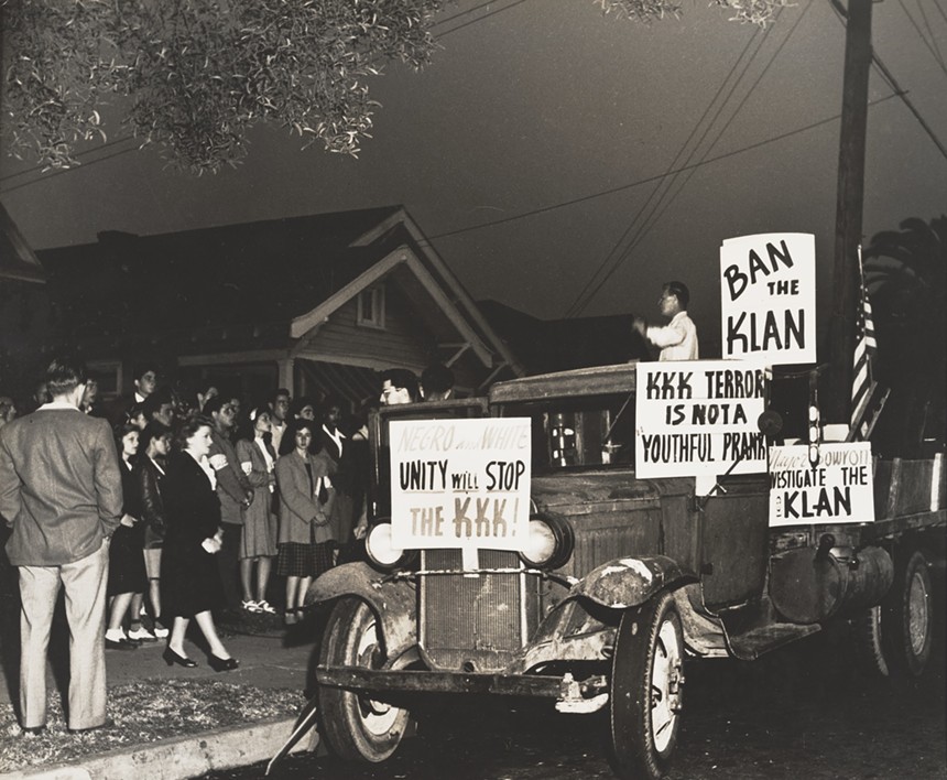 In 1946, there was a protest against the Ku Klux Klan in Los Angeles. The gelatin silver print photo was gifted to the University of Arizona, where it remains. - ARIZONA BOARD OF REGENTS