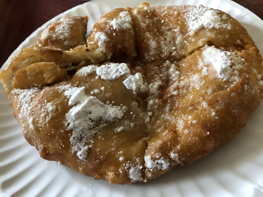 Fry bread with honey and powdered sugar at Indian Village. - SUSANA OROZCO