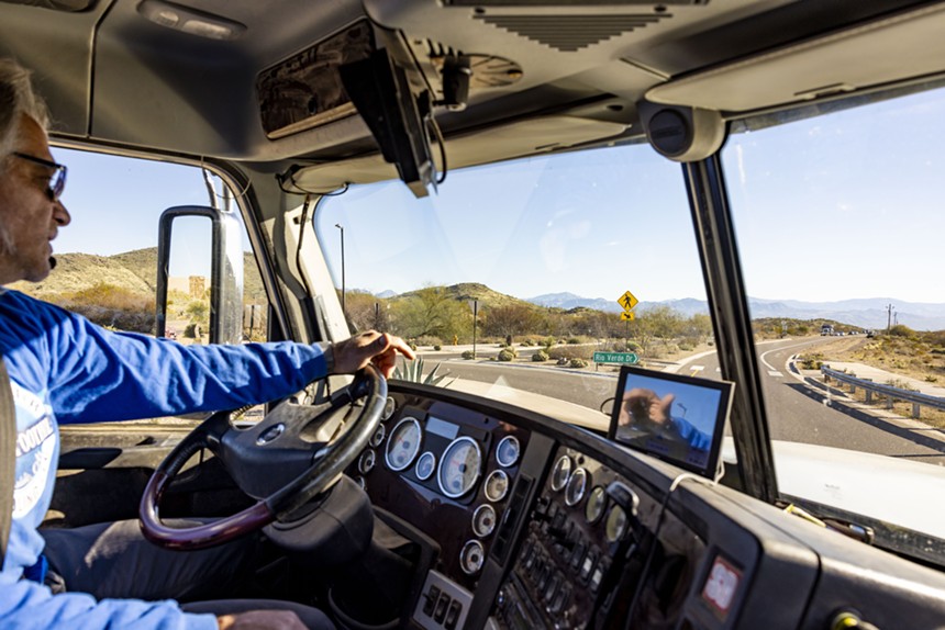 The view from the cabin of a water hauling truck in the Rio Verde Foothills. - ZEE PERALTA