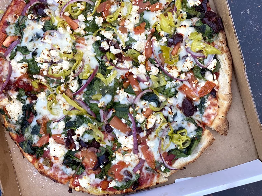 The Mamma's Signature at Spinato's combines spinach, Roma tomatoes, garlic, and the family's secret seasoning. - ALLISON YOUNG