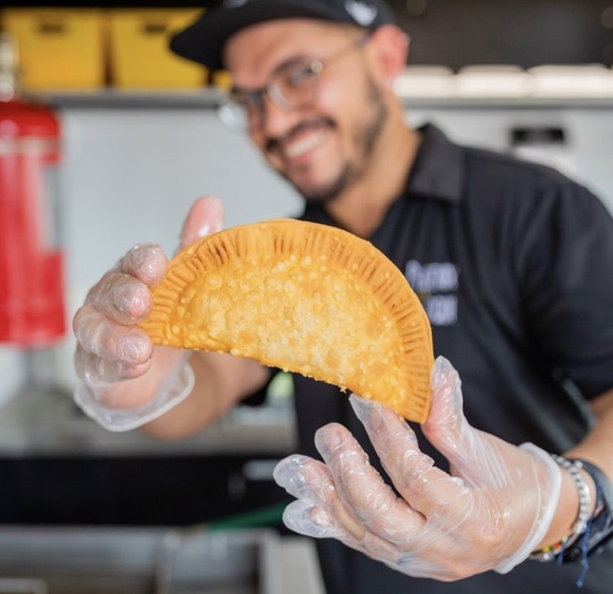 Juan Ayala puts heart and soul into his cooking. Try one of the mouthwatering empanadillas. - PHOENIX COQUI