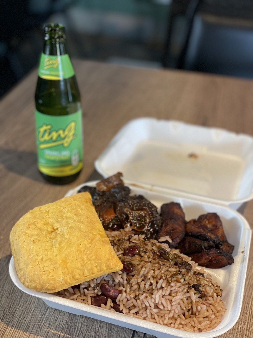 Ms. Martha's braised oxtail, plantain, rice and peas, and beef patty. - CYRUS GUCCIONE