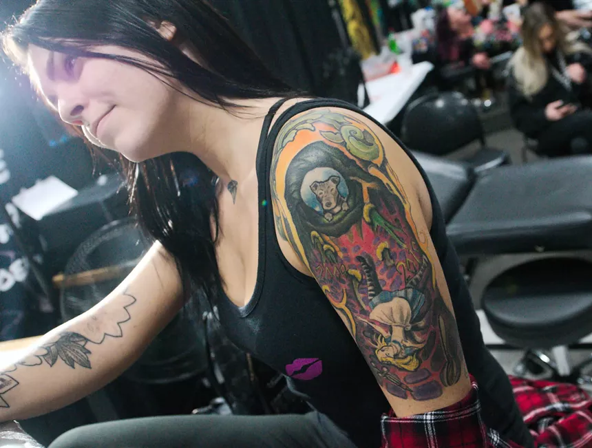 Alice takes a tumble down the rabbit hole in this tattoo. - BENJAMIN LEATHERMAN