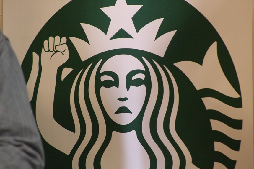 The Starbucks logo was modified to include a raised fist. - ELIAS WEISS