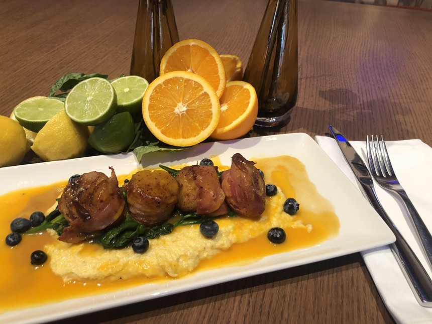 Pan-seared scallops on a bed of Ramona Farms polenta with nectarine butter sauce is one of Carcara's entree choices. - JENNIFER GOLDBERG