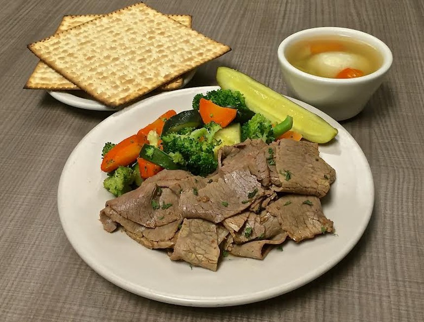 Brisket, vegetables, matzoh ball soup, and more for Passover at Miracle Mile Deli. - JOANIE SIMON