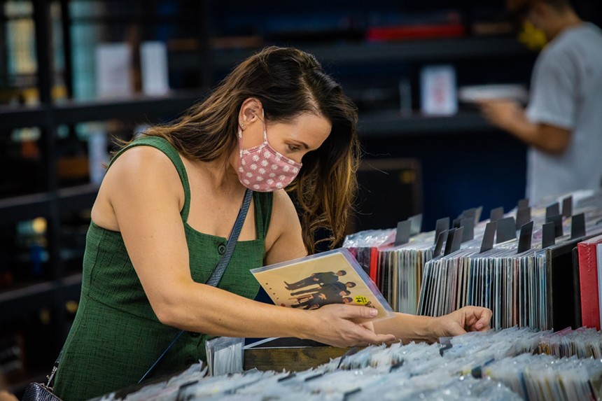 Digging for treasures during a 2020 Record Store Day at The 'In' Groove. - JACOB TYLER DUNN
