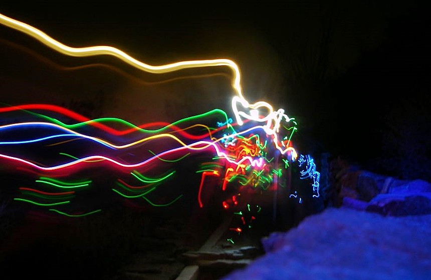 The illuminated scene at a previous Fluor-Ascent. - ARIZONA CACOPHONY SOCIETY