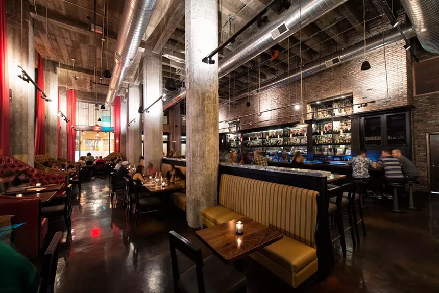 A neighborhood pizza joint in a cocktail bar makes total sense at Bitter & Twisted. - BITTER & TWISTED
