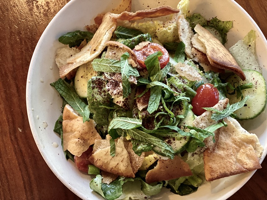 Alhoch’s take on this Middle Eastern salad with fresh mint and fried pita bread is totally vegan. - ALLISON YOUNG
