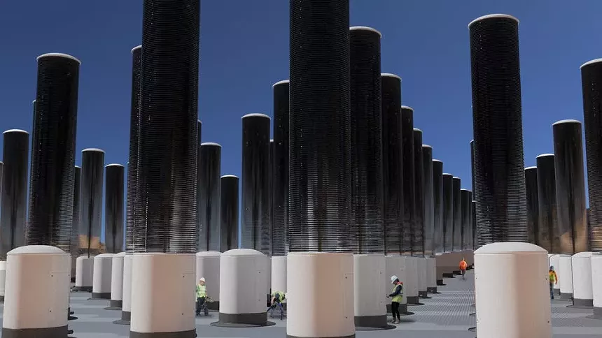 An artist's rendering of the MechanicalTree farm, developed by ASU professor Klaus Lackner and Silicon Kingdom Holdings, a company in Dublin. The farm will act as a passive carbon capture device and is expected to harvest 4 million tons of carbon dioxide every day. - SILICON KINGDOM HOLDINGS