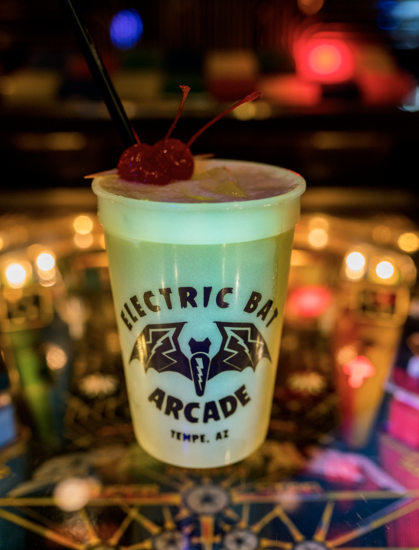 Tiki drinks at Electric Bat Arcade are served in glow-in-the-dark cups. - RACHEL BESS