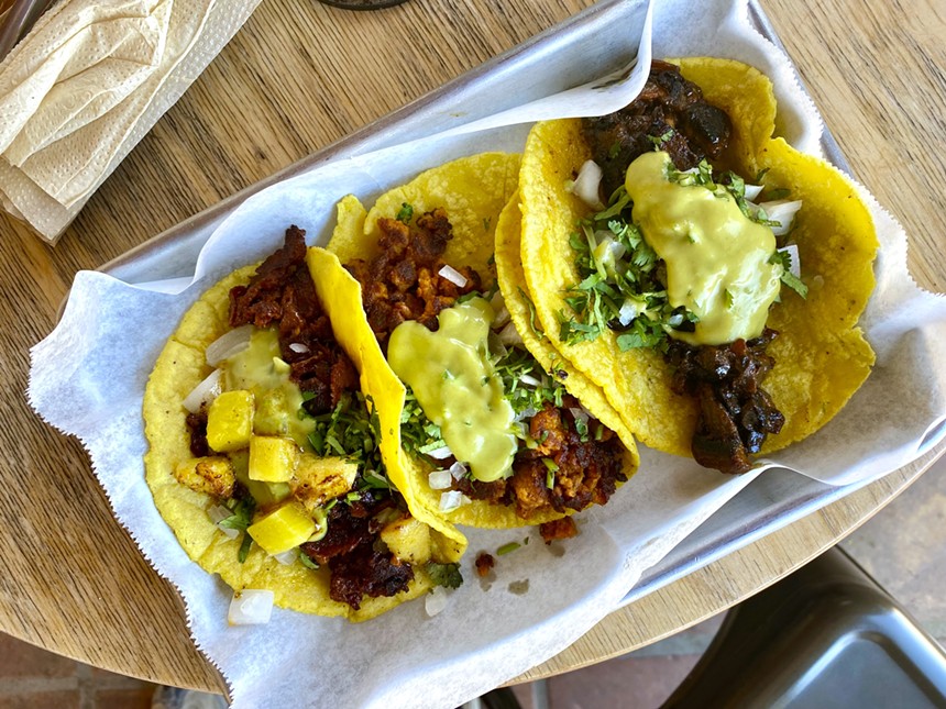 A trio of vegan tacos from Earth Plant Based Cuisine. - ALLISON YOUNG
