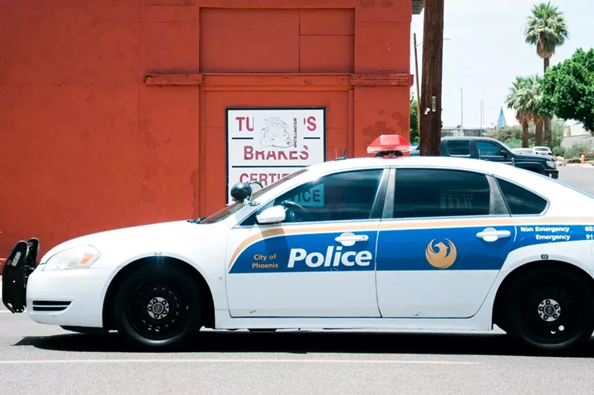 A Phoenix Police Department vehicle. - PONDE ASHES
