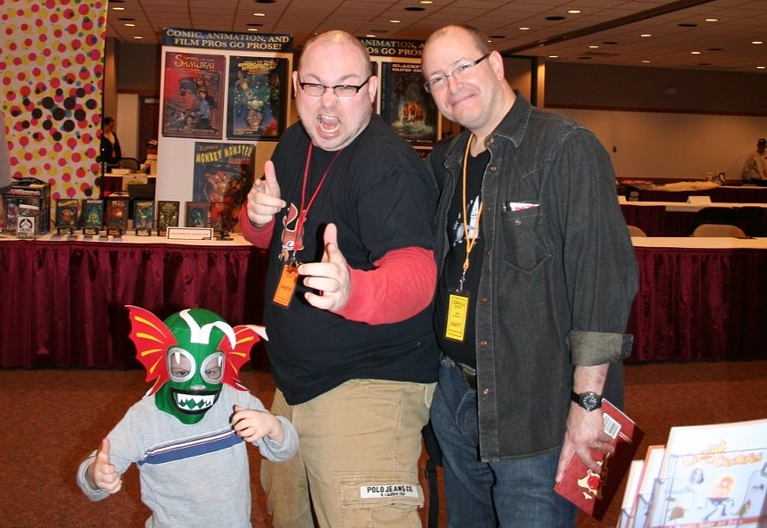 Steam Crow’s Daniel Davis (center) with his son Kaid (left) and Hellboy creator Mike Mignola (right) at Phoenix Cactus Comicon in 2007. - DANIEL DAVIS
