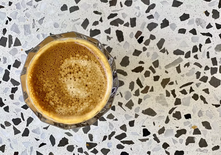 Sip a cortado on the terrazzo-covered terrace. - ALLISON YOUNG