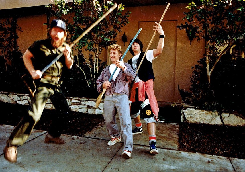 Alex Winter (center) and Keanu Reeves (right) clown around behind the scenes of Bill & Ted's Excellent Adventure. - PHILLIP CARUSO