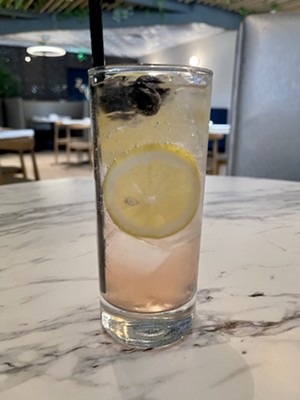 The Seoul Highball is made with soju, berries, seasonal herbs and sparkling mineral water. - TIRION MORRIS