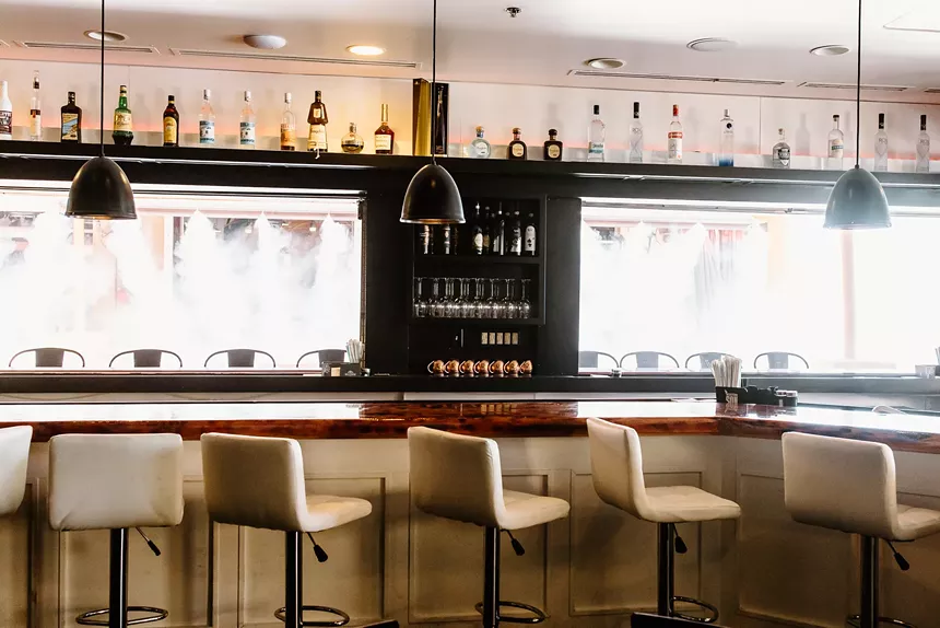 From wines to specialty cocktails, Sfizio serves happy hour all day Monday through Friday at the bar. - NIKKI MICHELLE CHARNSTROM