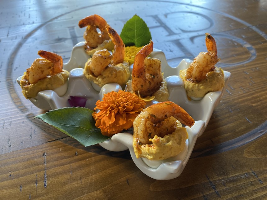 The La Di-Da-Dis, deviled eggs topped with grilled Cajun shrimp, are a customer favorite, Fields says. - NATASHA YEE