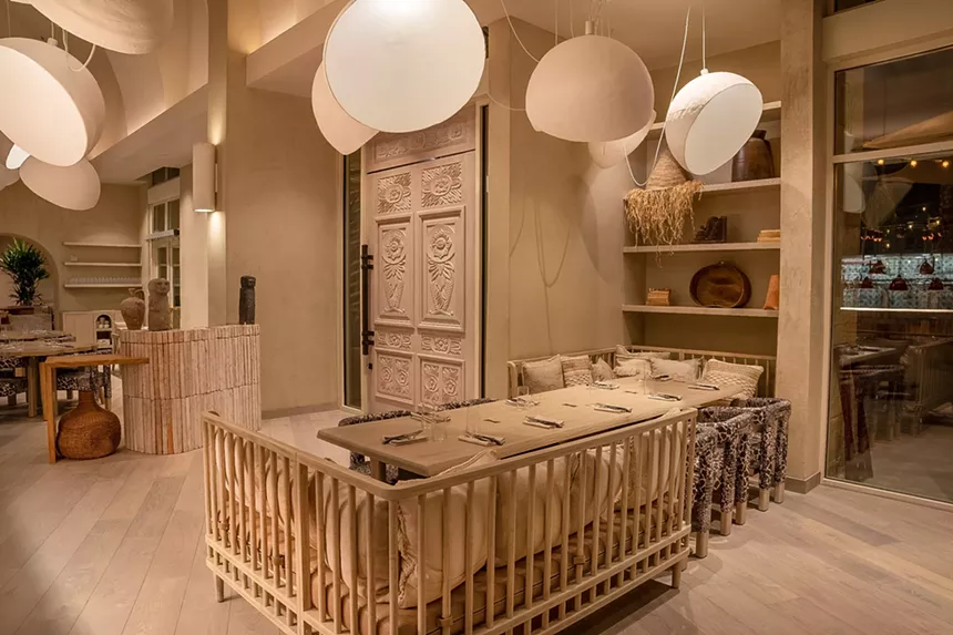 A seating area inside the newly opened Tía Carmen restaurant. - AUNT CARMEN