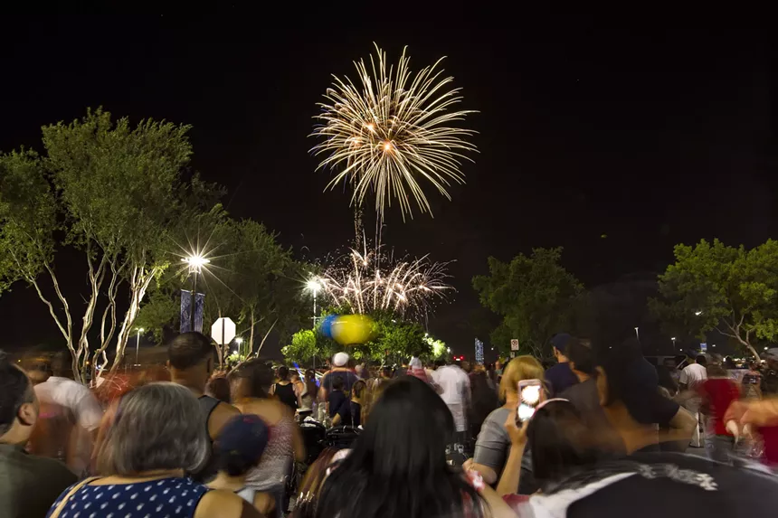 Fireworks bloom above Westgate Entertainment District in Glendale. - JENNIFER CONWAY WITH MARK SKALNY PHOTOGRAPHY