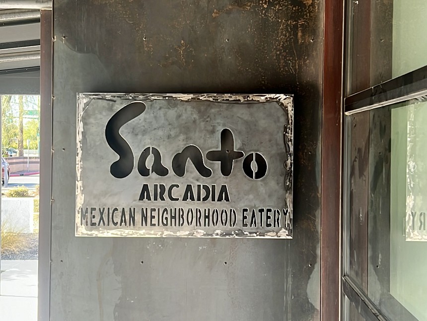 Santo Arcadia metal sign.
