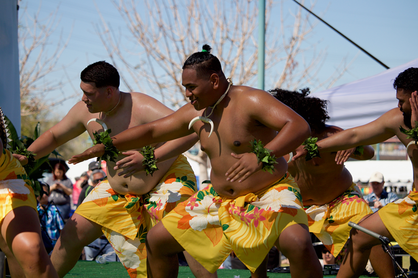 Hawaiian dancers perform.