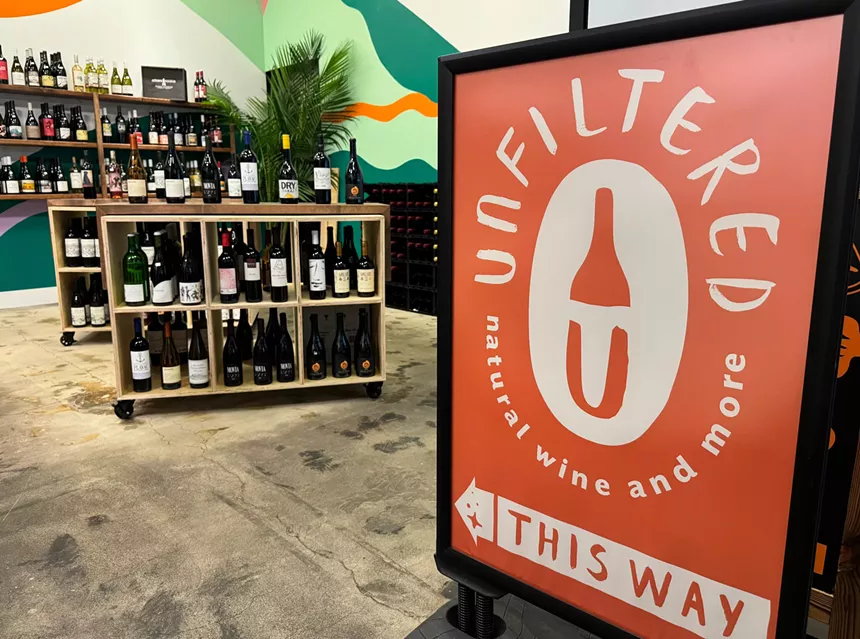 Sign for Unfiltered Natural Wine shop.