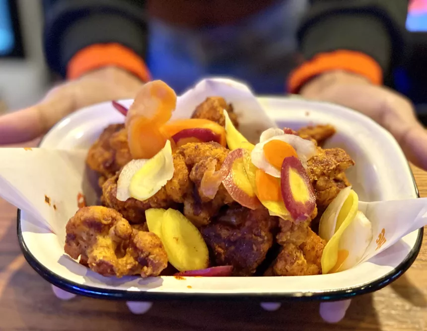 Wings and sliced veggies at The Hot Chick.